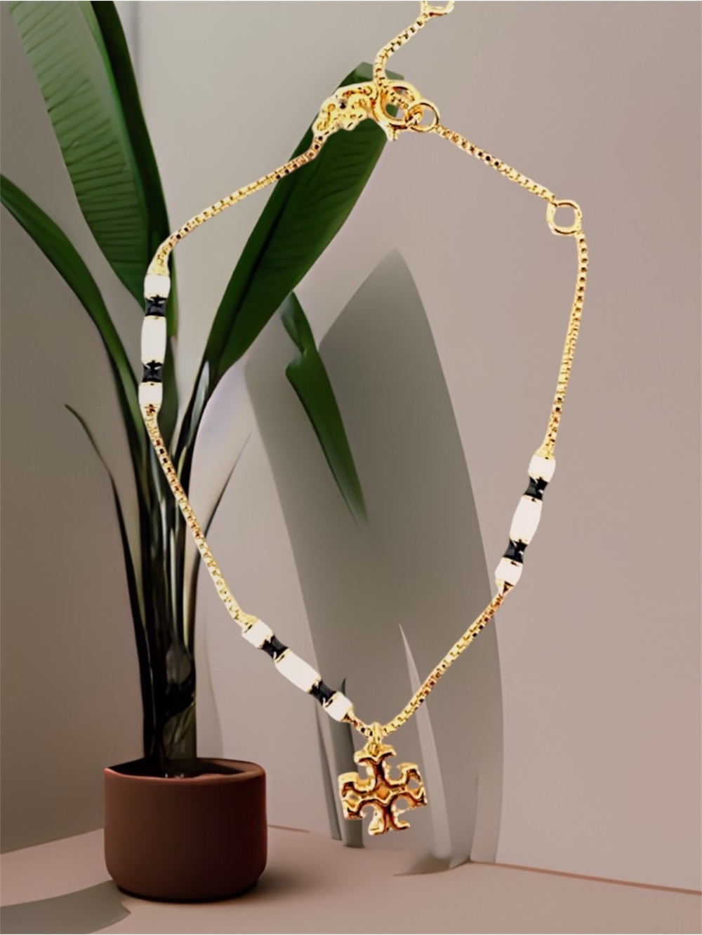 Tory Burch Dainty Gold Chain Bracelet white and Black Beads